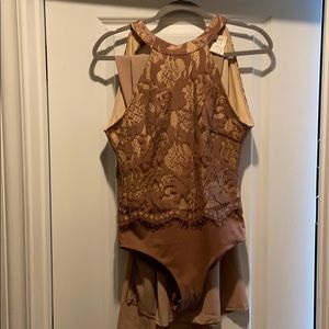 Beautiful lace top body suit
